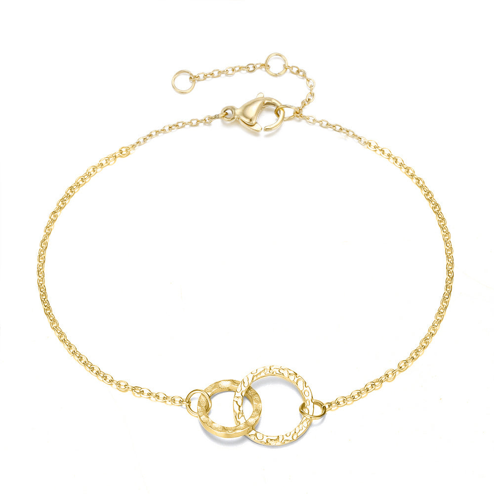 Radiant Circle: Gold-Plated Stainless Steel Round Bracelet