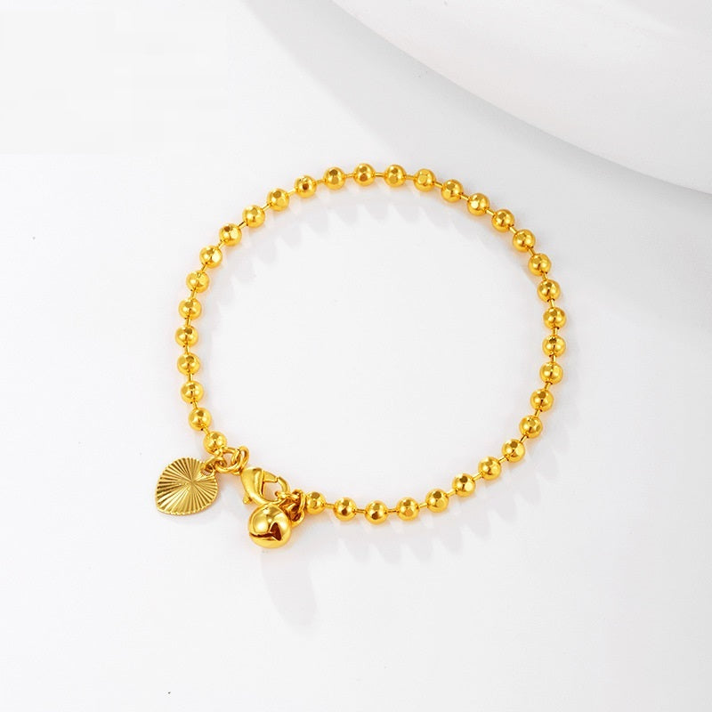 Golden Radiance: Gold-Plated Ball Bracelet