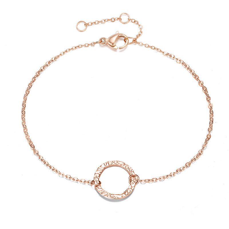 Radiant Circle: Gold-Plated Stainless Steel Round Bracelet